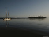 A Schooner Sits Moored in Neah Bay as the Morning Sun Rises