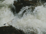 A Kayaker Braves the Green River Rapids