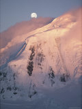 The Moon Rises over Snow- Blown Peaks on Anvers Island