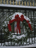 Fresh Snow Covers a Christmas Wreath on the White House Gate