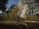 Scenic Autumn View of the Merced River Winding Below Huge Cliffs