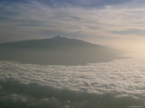 A Spectacular View of the Peak of Mount Kenya Above the Clouds