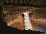 Sunlight Illuminates a Ladder Leading Down to a Kiva  Cedar Mesa