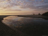 A Tidal Pool Reflects the Sky Above