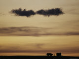 Wagons Silhouetted at Twilight