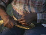 Close View of a Basket Weaver at Work