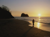 Figure Silhouetted on a Beach at Sunset  Costa Rica