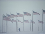 A Skier Enjoys a Snowy Day on the Grounds of the Washington Monument