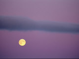 A Twilight View of the Full Moon over the Canadian Arctic