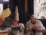 Offerings Made to Buddha in an Angkor Wat Temple