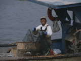 Smiling Fisherman on a Crab Boat