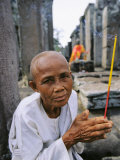 Offerings Made to Buddha at an Angkor Wat Temple