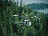 The Swirling Blades of a Helicopter Used for Logging Fill the Air
