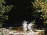 Mountain Biker Splashing Through Water at High Speed  Canaan Valley