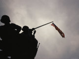 The Iwo Jima Memorial Silhouetted against a Cloudy Sky