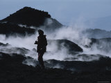 Carten Peter Stands Amidst Smoldering Volcanic Rock