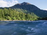 A Mountain Peak Looms over the Aqua Water of the Futaleufu River