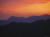 Sunset Silhouettes the Mountains Near the Mutinanyu Section of the Great Wall