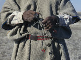 A Chipaya Indian Holding a Bola Used to Hunt Flamingos