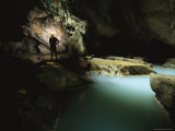 A Scientist Silhouettted Beneath a Skylight in Cueva De Villa Luz