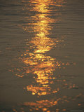 The Sunset Casts an Orange Hue on the Mackenzie River