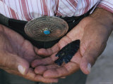Close View of an Indian Man Holding an Arrowhead