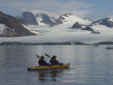 Kayakers Explore Hornsund Fjord in Svalbard