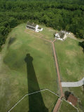 The Cape Hatteras Lighthouse Overlooking its Shadow and Grounds