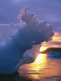 Waves and Sunlight Shape a Small Iceberg