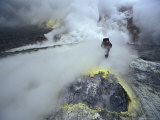 Volcanologist Probes Fumaroles on a Sulfur-Encrusted Crater