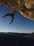 Young Woman Climbing the Rock Feature Called Perry the Wind