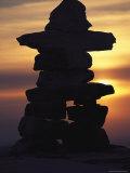 Cairn Marker Silhouetted Against the Evening Sky