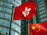 The Flag of Hong Kong Next to a Peoples Republic of China Flag
