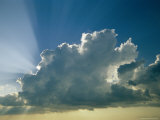 Rays of Sunlight Peek Out from Behind a Cloud