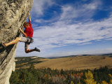 Young Man Climbing the Rock Feature Known as Bobcat Logic