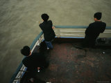 Men Stand Against the Railing of a Boat on the Yangtze River