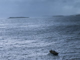 Salmon Fishermen Rowing Out to Check Their Nets