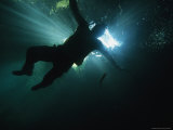 Archeologist Swims into the Entrance of Actun Tunichil Muknal