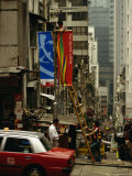 Workers Post Banners on Staunton Street in the Soho Area of Central