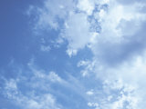 Blue Sky and Puffy White Clouds
