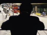 Man Looks Out of the Window of a Traditional Tram