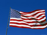 American Flag Flies in a Clear Blue Sky