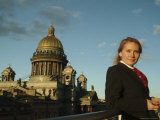 A Woman Stands in Front of Saint Isaacs Cathedral