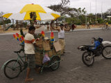 Street Vendors Hawking Goods from Carts on an Island Street