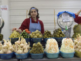 A Russian Woman Sells Salads and Pickles from an Outdoor Stand