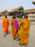 Three Saffron-Robed Monks Tour and Take Photos in the Forbidden City