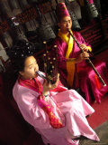 Musicians Perform on Traditional Instruments