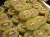 Street Vendors Sell Slices of Kiwi Fruit on Skewers