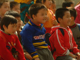 Children Watch a Performance at Beijings Cultural Ethnic Park
