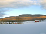 Snowy Landscape with Mountains and Farms